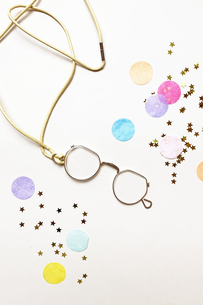 Collana lenti e cordino giallo