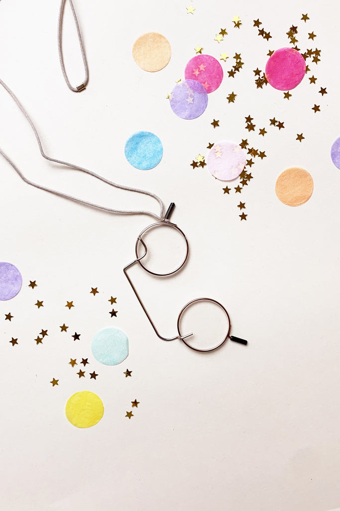 Collana lenti rotonde cordino ecrù