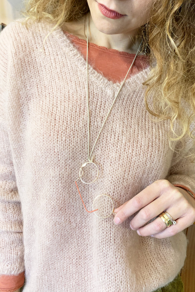 Collana lenti rotonde e smalto arancio